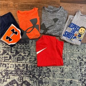 Bundle of under armour shirts and 1 Nike